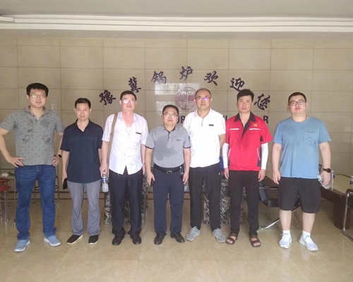 豫冀公司技术人员与西交大赵钦新教授团队讨论锅炉结构问题